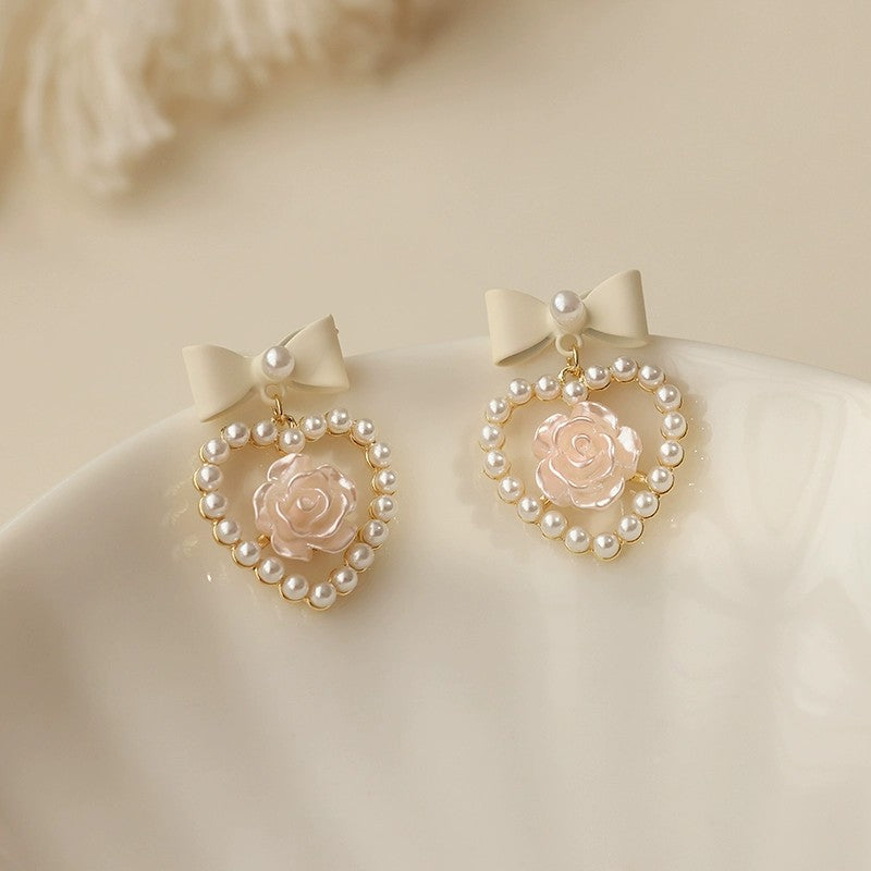 Pearl bow earrings HA1797